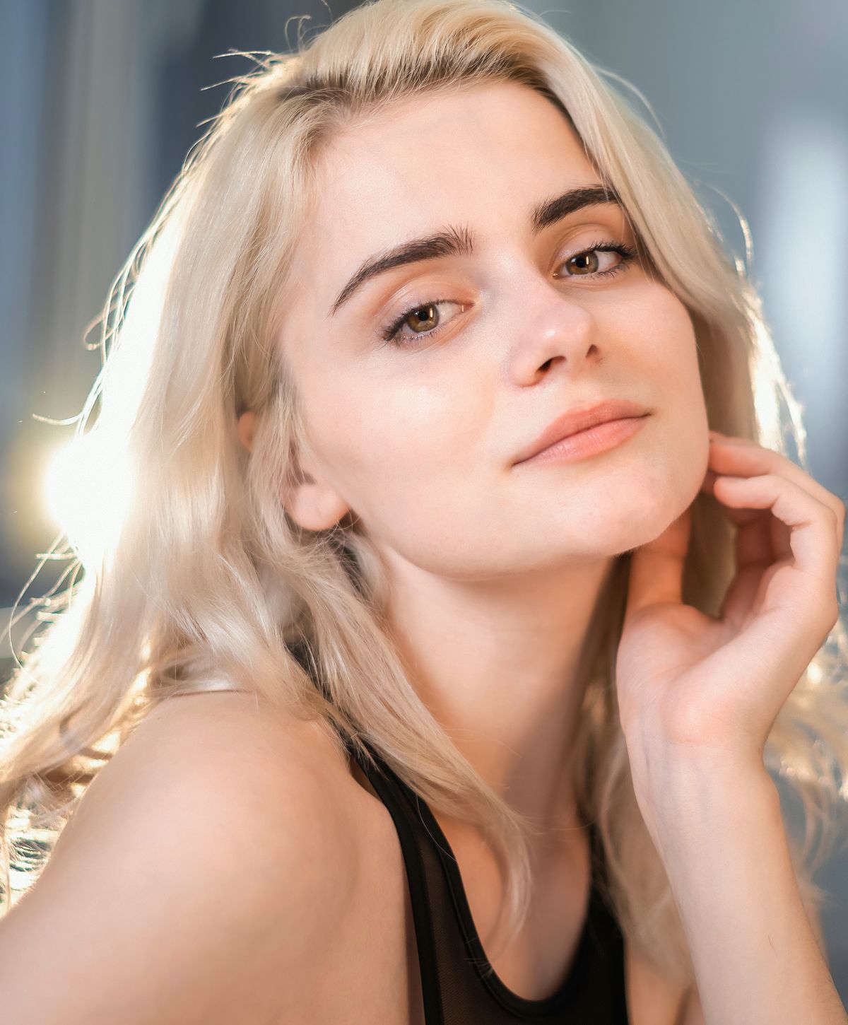 Close-up of a woman showcasing natural beauty.