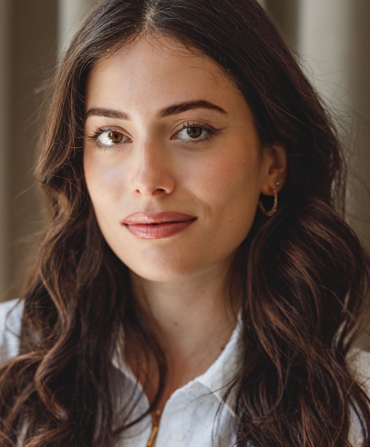 Close-up of a woman showcasing natural beauty.