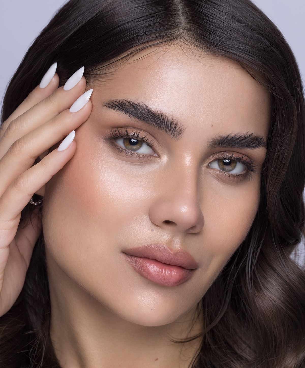 Close-up of a woman showcasing natural beauty.