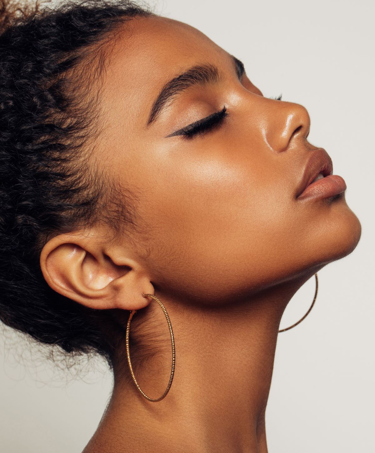 Close-up of a woman showcasing natural beauty.